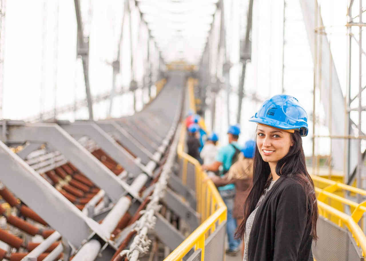 Image of a woman supervisor at a construction project on a bridge