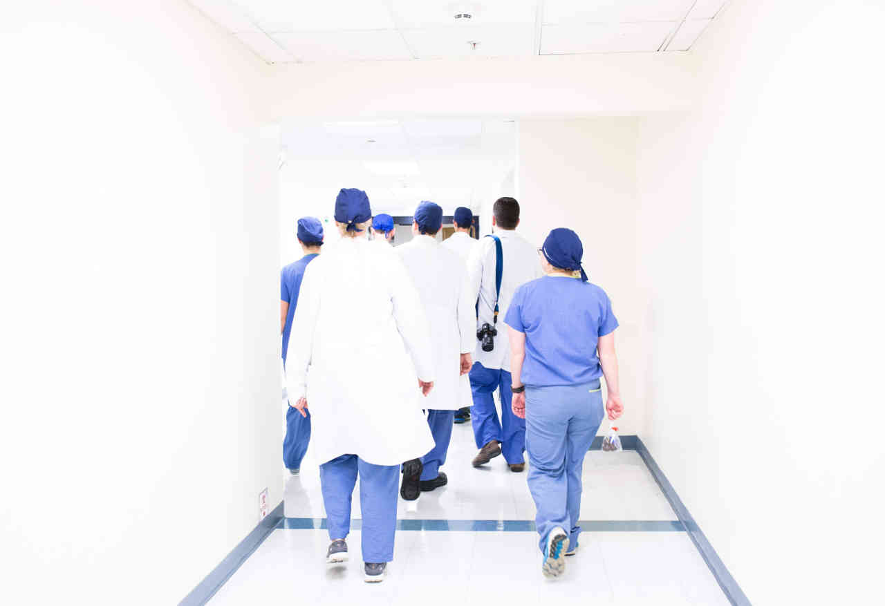 Image of medical staff walking in a hospital hallway