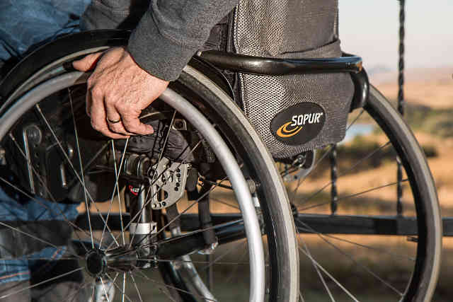 Image of a man in a wheelchair